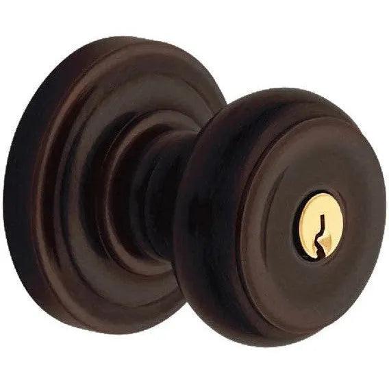 Baldwin 5210 Keyed Colonial Knob with Classic Rosette Venetian Bronze