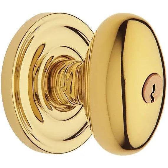 Baldwin 5225 Keyed Egg Knob with Classic Rosette Unlacquered Brass