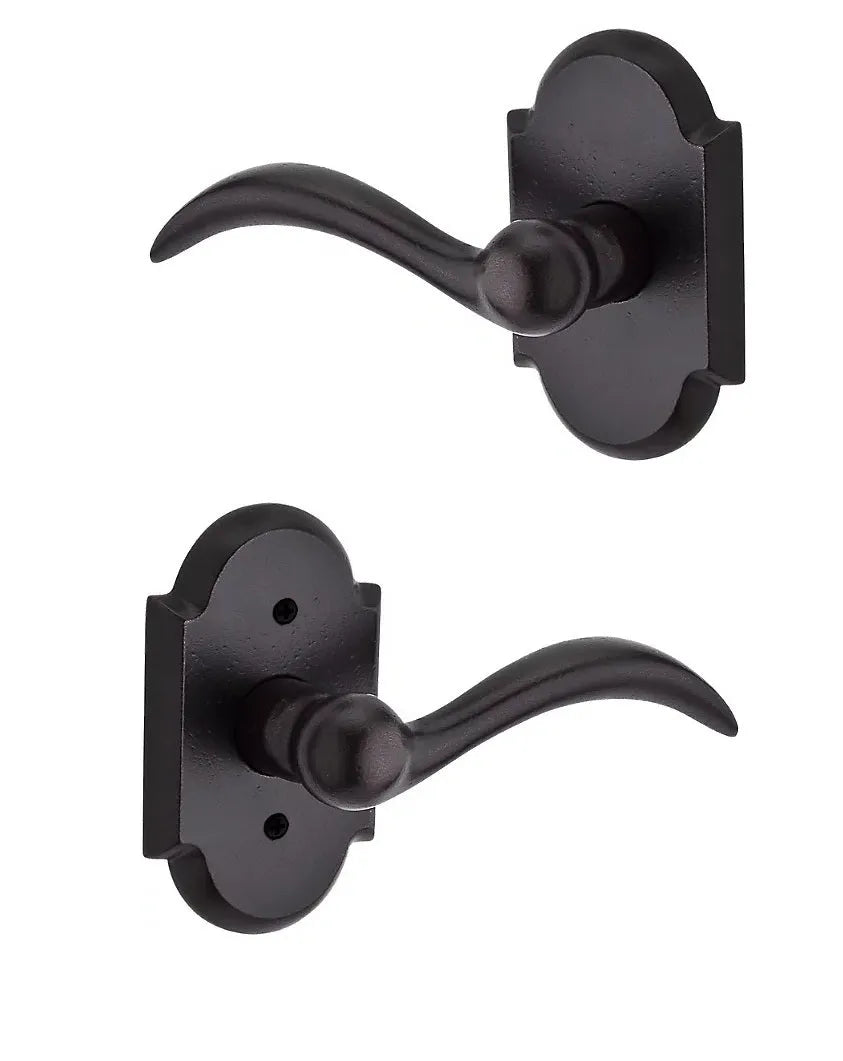 Baldwin Arch Lever with Rustic Arch Rosette in Dark Bronze finish