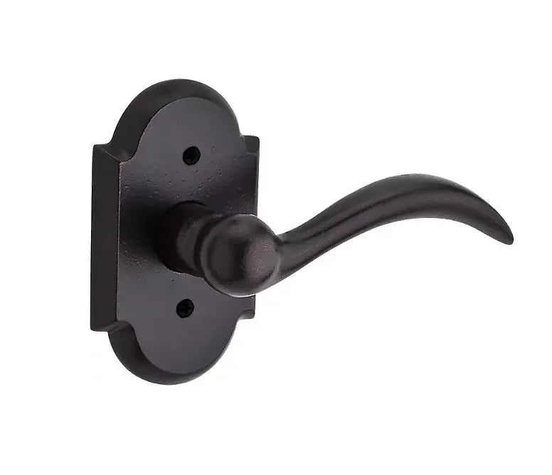 The Baldwin Reserve Arch Lever with Rustic Arch Rosette in Dark Bronze finish.