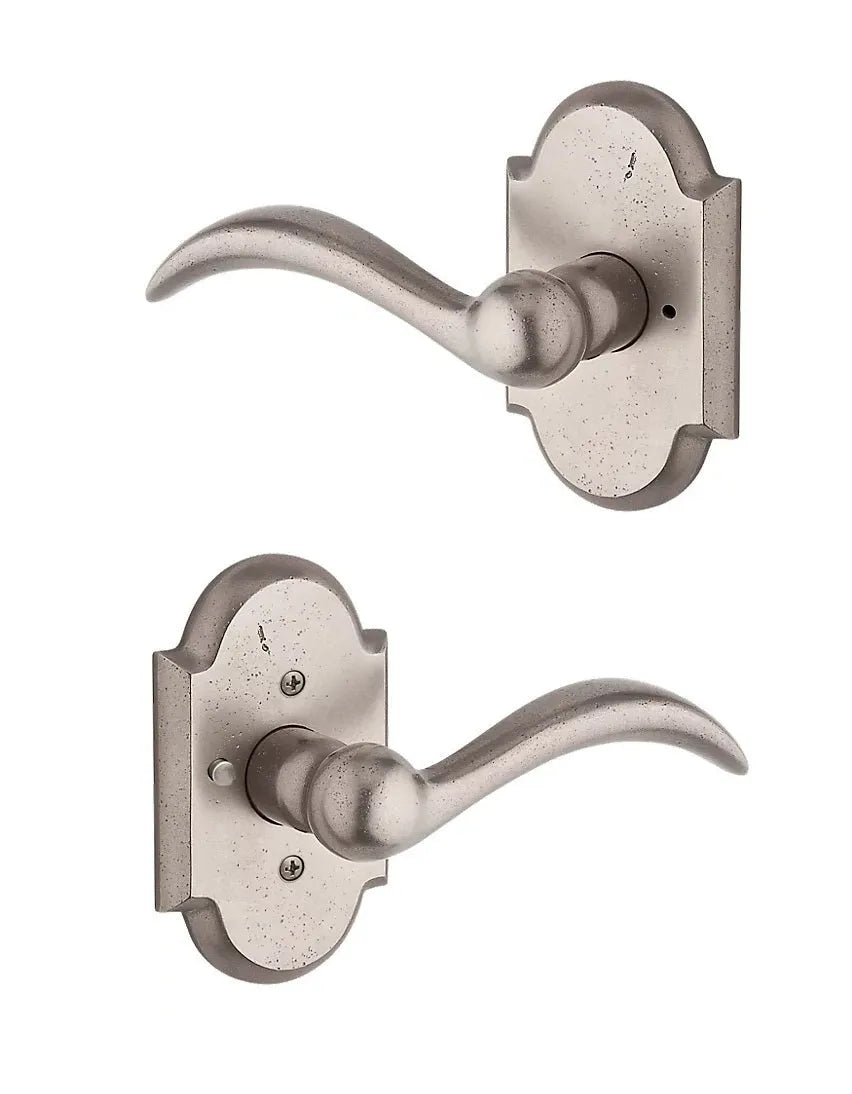 Baldwin Arch Lever with Rustic Arch Rosette in White Bronze finish