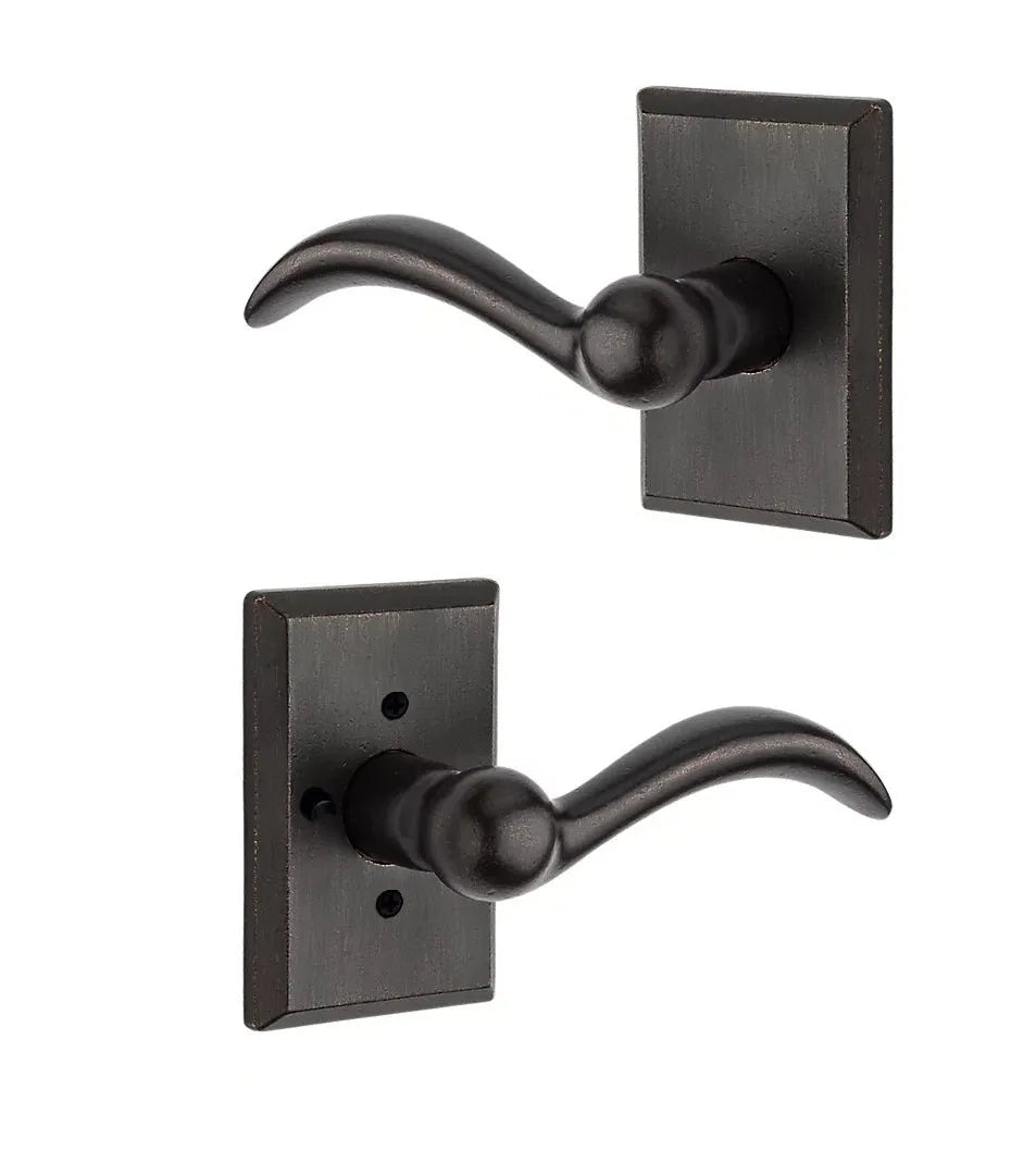 Baldwin Arch Lever with Rustic Square Rosette in Dark Bronze finish
