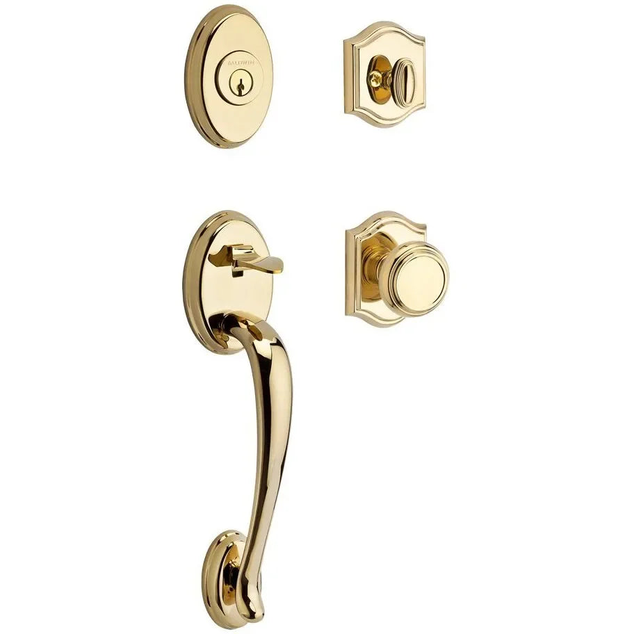 The Baldwin Reserve Columbus Handleset with Interior Traditional Knob with Traditional Arch Rosette in Lifetime Polished Brass finish.