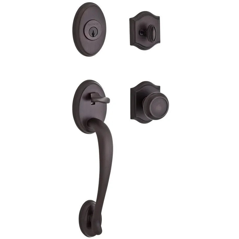 The Baldwin Reserve Columbus Handleset with Interior Traditional Knob with Traditional Arch Rosette in Venetian Bronze finish.