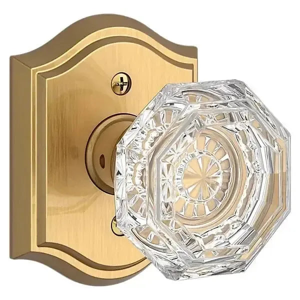 Baldwin Crystal Knob with Traditional Arch Rosette in Lifetime Satin Brass finish