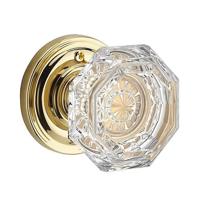 The Baldwin Reserve Crystal Knob with Traditional Round Rosette in Lifetime Polished Brass finish.