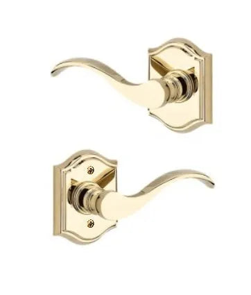 Baldwin Curve Lever with Traditional Arch Rosette in Lifetime Polished Brass finish