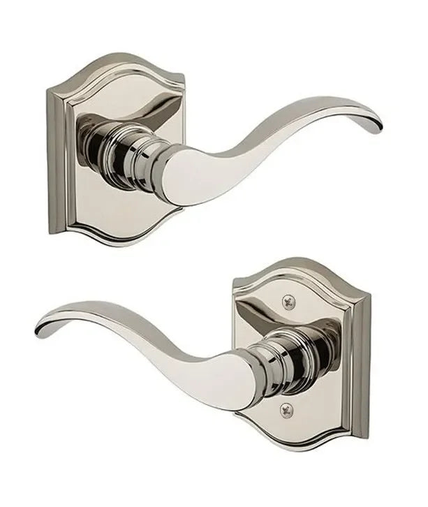 The Baldwin Reserve Curve Lever with Traditional Arch Rosette in Lifetime Polished Nickel finish.