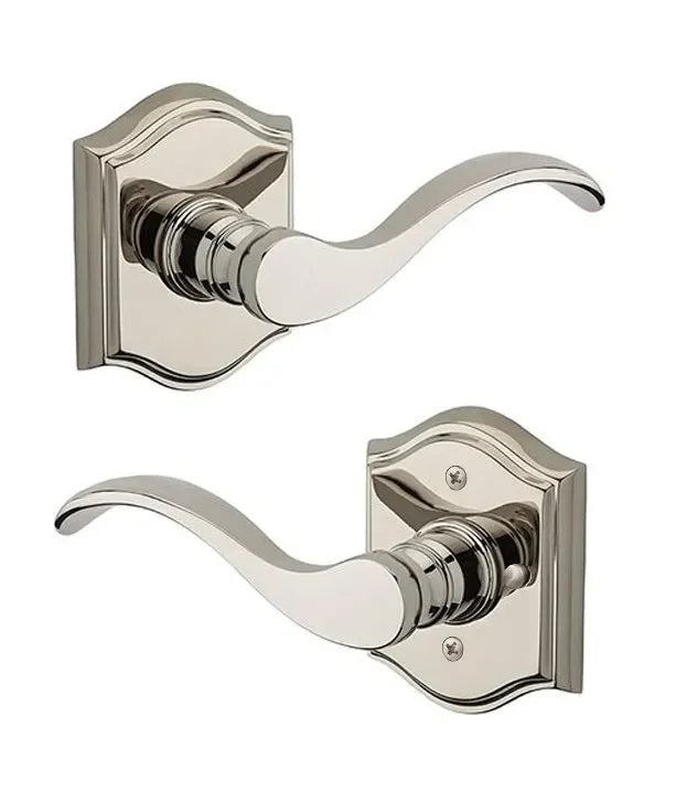 The Baldwin Reserve Curve Lever with Traditional Arch Rosette in Lifetime Polished Nickel finish.