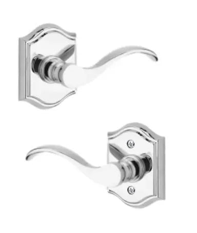 The Baldwin Reserve Curve Lever with Traditional Arch Rosette in Polished Chrome finish.