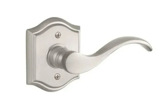The Baldwin Reserve Curve Lever with Traditional Arch Rosette in Satin Nickel finish.