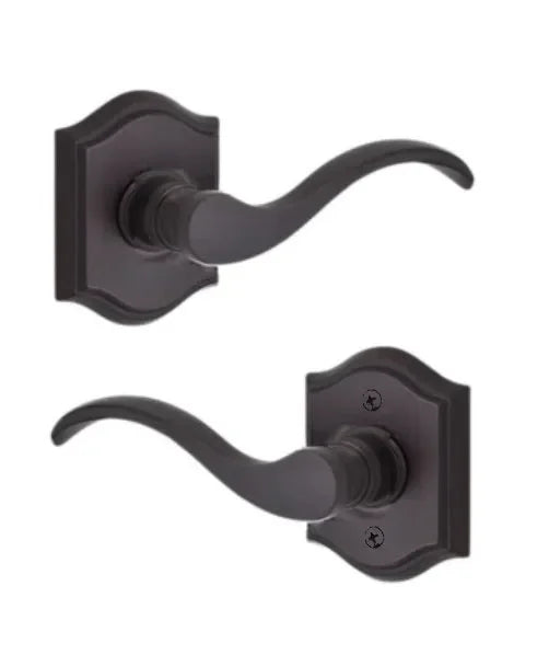 The Baldwin Reserve Curve Lever with Traditional Arch Rosette in Venetian Bronze finish.
