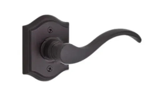 The Baldwin Reserve Curve Lever with Traditional Arch Rosette in Venetian Bronze finish.