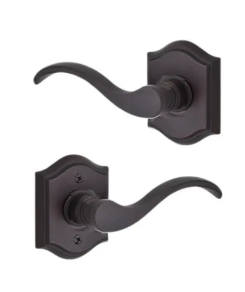 Baldwin Curve Lever with Traditional Arch Rosette in Venetian Bronze finish