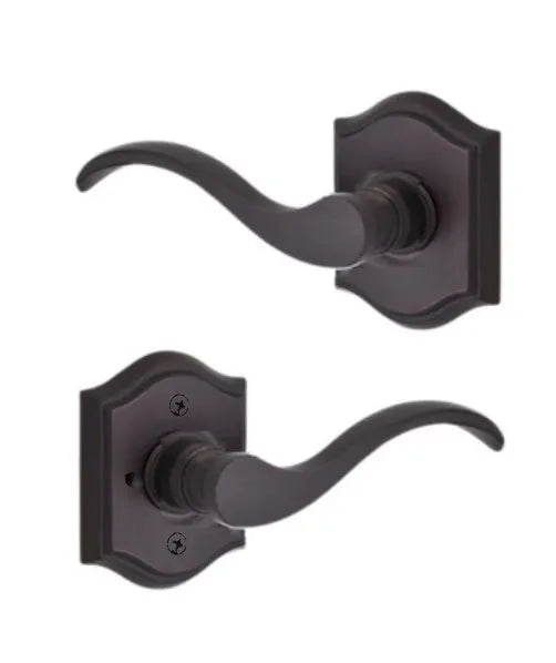 Baldwin Curve Lever with Traditional Arch Rosette in Venetian Bronze finish