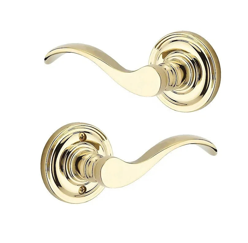 Baldwin Curve Lever with Traditional Round Rosette in Lifetime Polished Brass finish