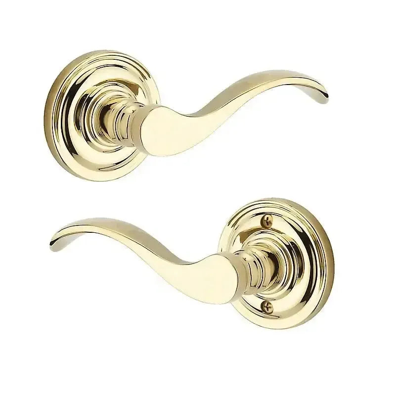 Baldwin Curve Lever with Traditional Round Rosette in Lifetime Polished Brass finish