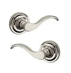 The Baldwin Reserve Curve Lever with Traditional Round Rosette in Lifetime Polished Nickel finish.