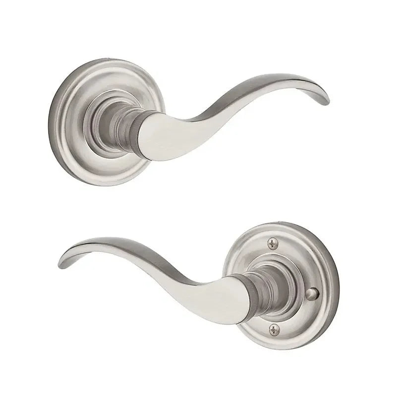 The Baldwin Reserve Curve Lever with Traditional Round Rosette in Satin Nickel finish.
