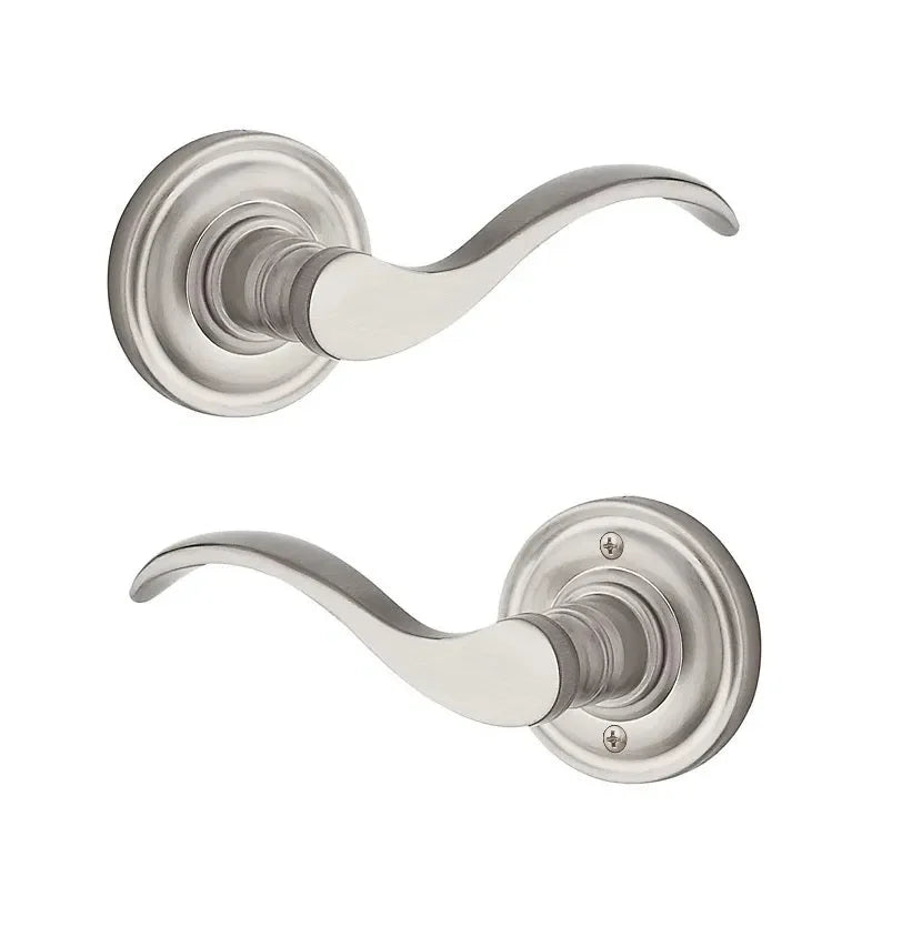 The Baldwin Reserve Curve Lever with Traditional Round Rosette in Satin Nickel finish.