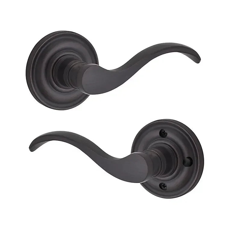 The Baldwin Reserve Curve Lever with Traditional Round Rosette in Venetian Bronze finish.