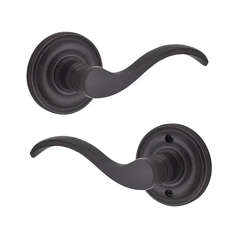 The Baldwin Reserve Curve Lever with Traditional Round Rosette in Venetian Bronze finish.