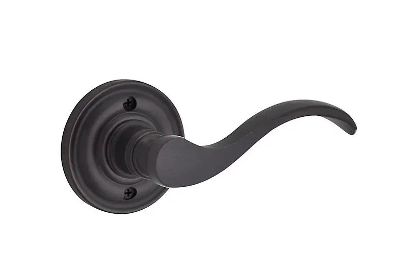 The Baldwin Reserve Curve Lever with Traditional Round Rosette in Venetian Bronze finish.