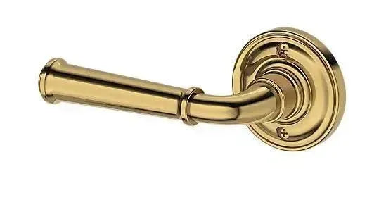 Baldwin Dunsmoor Lever with Traditional Round Rosette in Lifetime Polished Brass finish