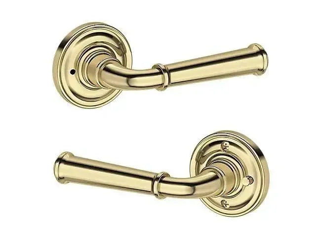 Baldwin Dunsmoor Lever with Traditional Round Rosette in Non-Lacquered Brass finish