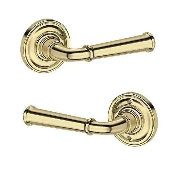 Baldwin Dunsmoor Lever with Traditional Round Rosette in Non-Lacquered Brass finish