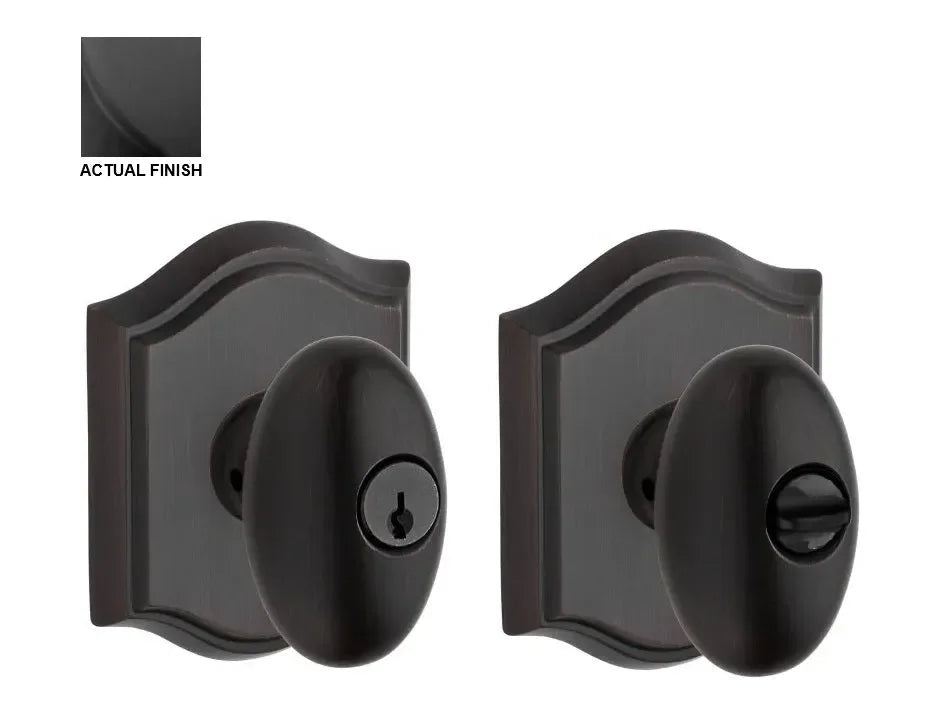 Baldwin Ellipse Knob with Traditional Arch Rosette Satin Black