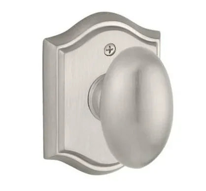 Baldwin Ellipse Knob with Traditional Arch Rosette Satin Nickel