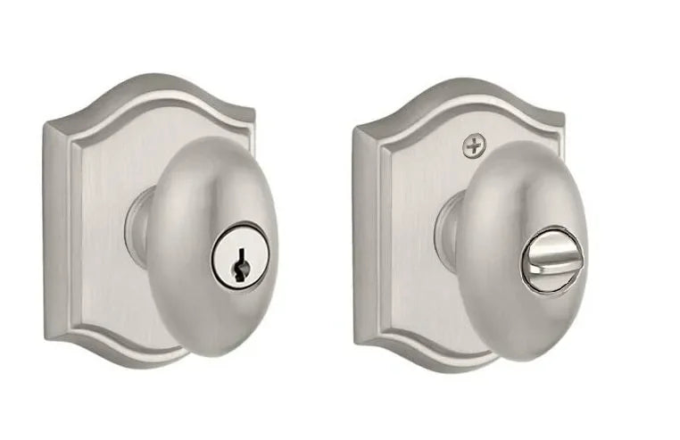 Baldwin Ellipse Knob with Traditional Arch Rosette Satin Nickel