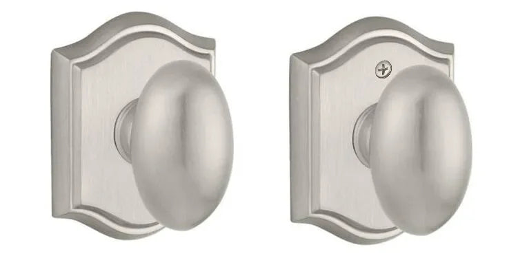 Baldwin Ellipse Knob with Traditional Arch Rosette Satin Nickel