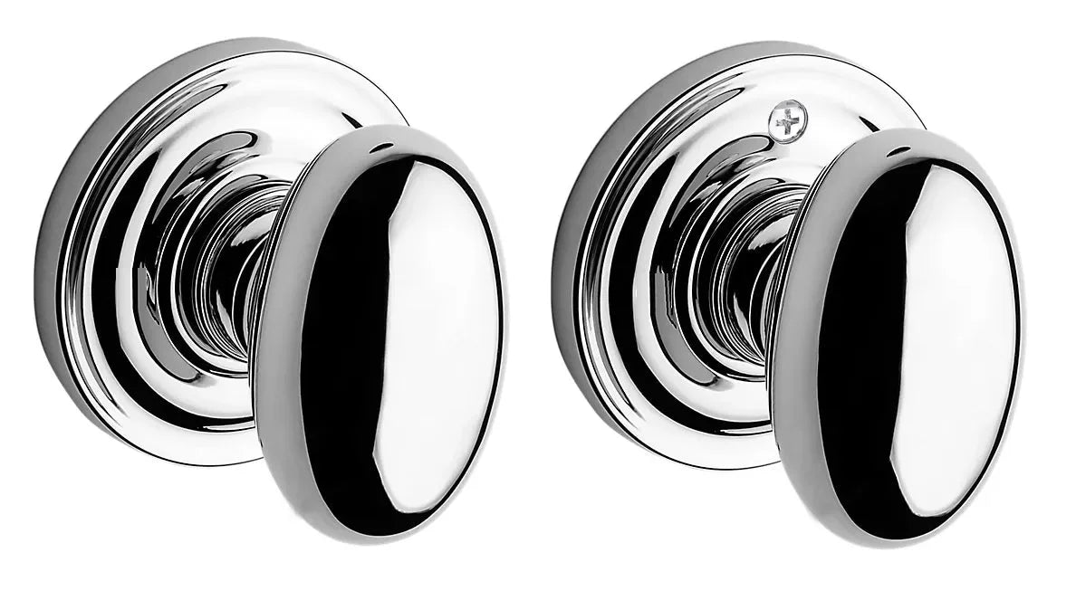 The Baldwin Reserve Ellipse Knob with Traditional Round Rosette in Polished Chrome finish.