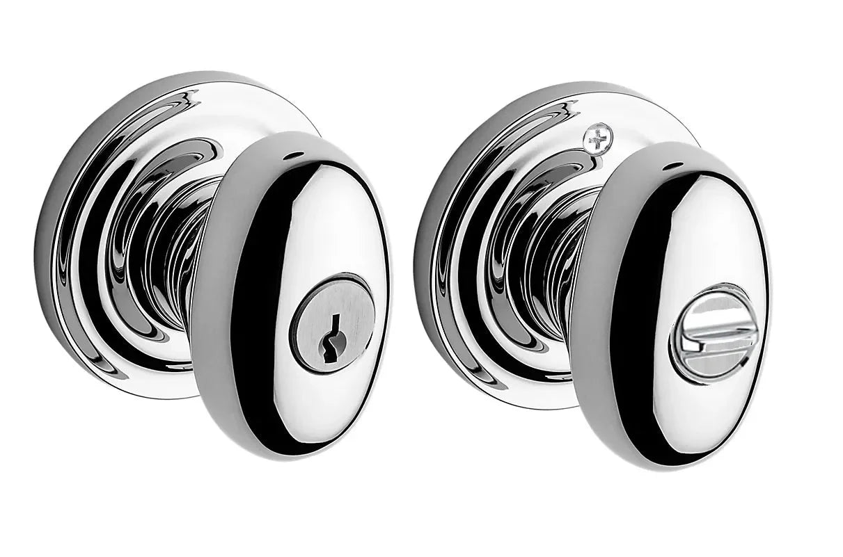 The Baldwin Reserve Ellipse Knob with Traditional Round Rosette in Polished Chrome finish.