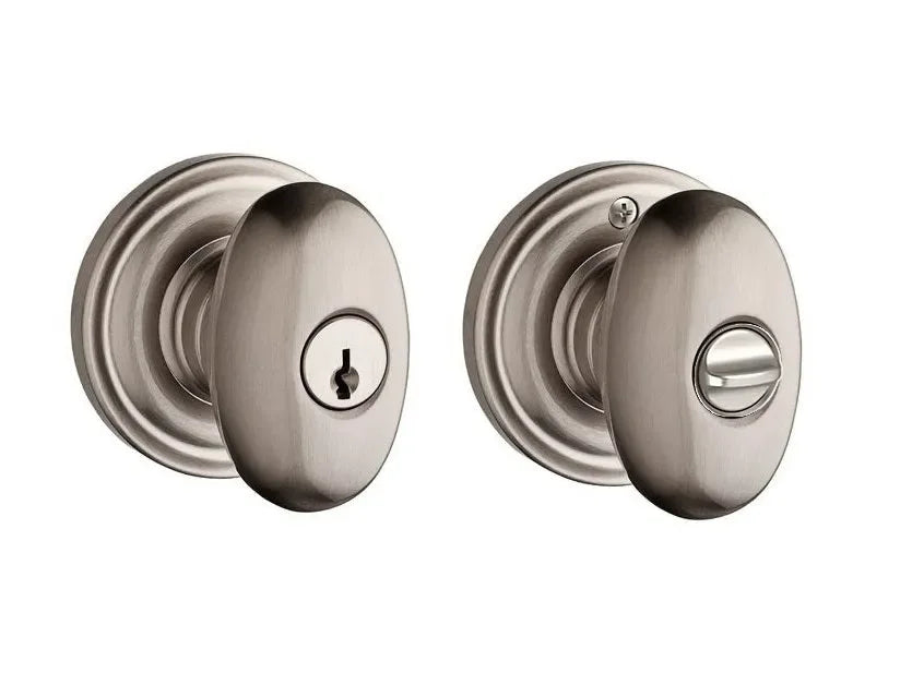 The Baldwin Reserve Ellipse Knob with Traditional Round Rosette in Satin Nickel finish.