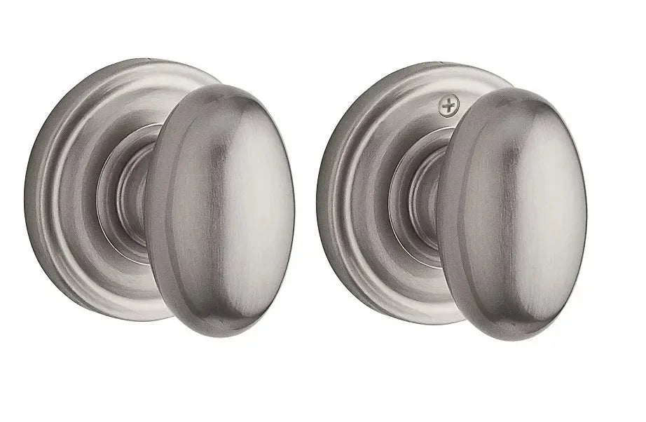The Baldwin Reserve Ellipse Knob with Traditional Round Rosette in Satin Nickel finish.