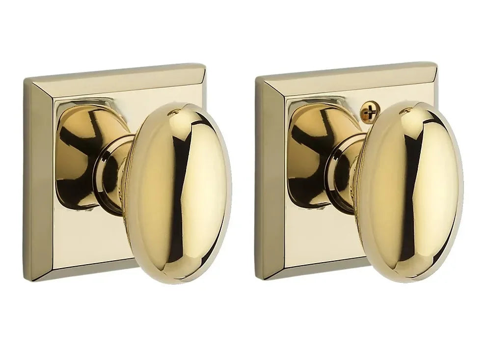 Baldwin Ellipse Knob with Traditional Square Rosette Lifetime Polished Brass