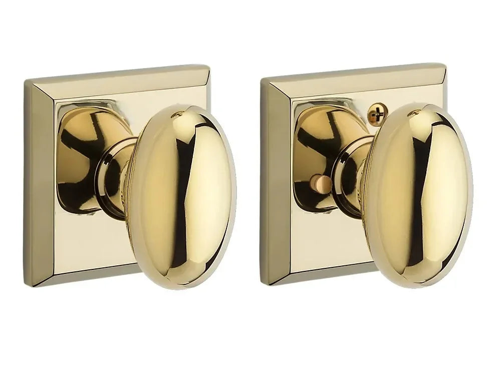 Baldwin Ellipse Knob with Traditional Square Rosette Lifetime Polished Brass