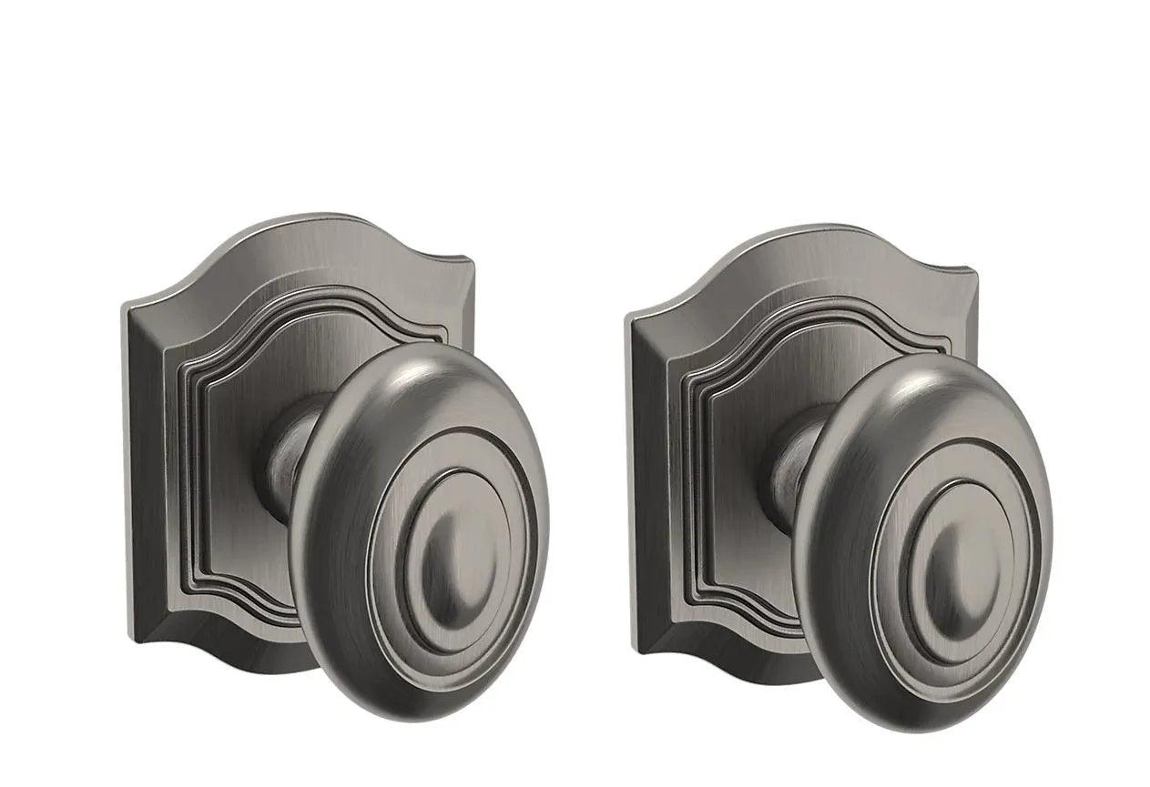 The Baldwin Estate 5077 Bethpage Knob with R027 in Graphite Nickel finish.