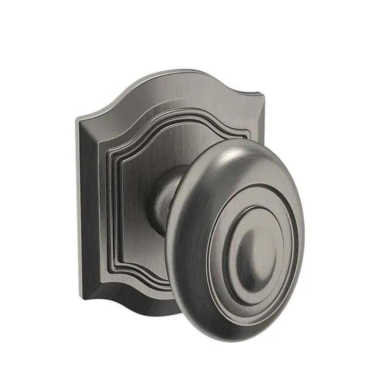 The Baldwin Estate 5077 Bethpage Knob with R027 in Graphite Nickel finish.