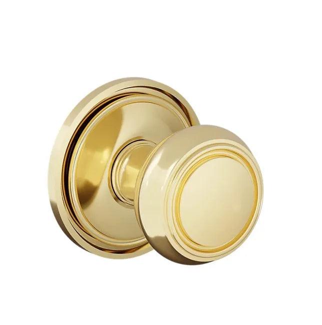 The Baldwin Estate 5087 Nashville Knob (2") with 5070 Rosette in Lifetime Polished Brass finish.