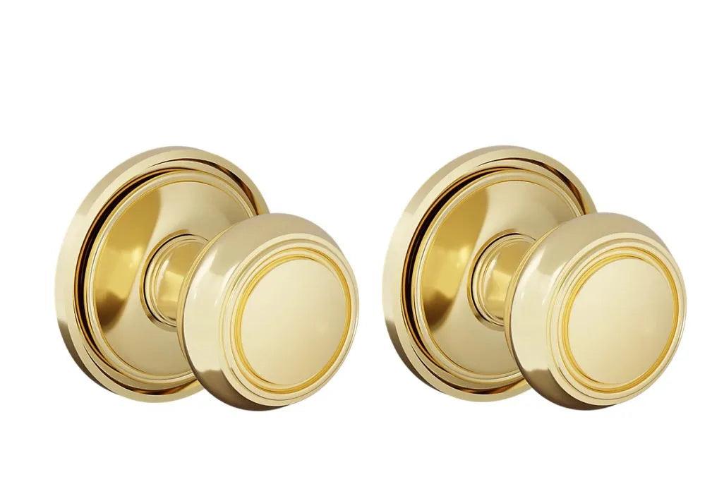 The Baldwin Estate 5087 Nashville Knob (2") with 5070 Rosette in Lifetime Polished Brass finish.