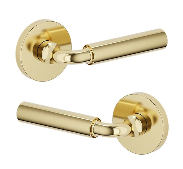 The Baldwin Estate L031 Gramercy Curved Lever with 5046 Rosette in Lifetime Polished Brass finish.