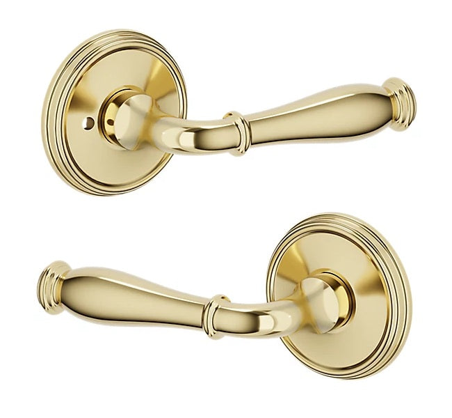 The Baldwin Estate L034 Nashville Lever with 5078 Rosette in Lifetime Polished Brass finish.