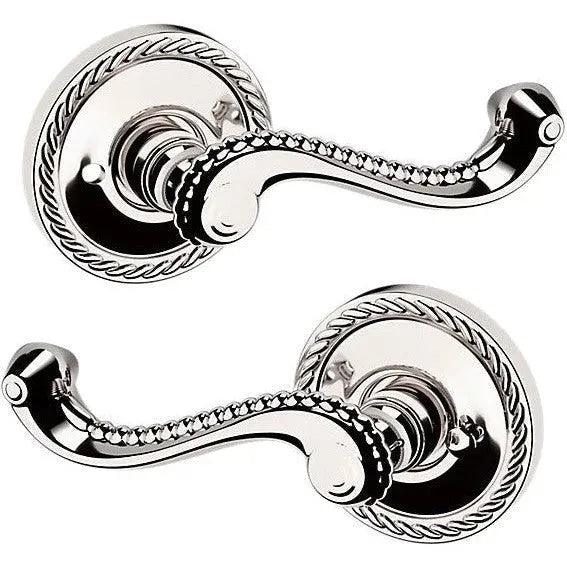 Baldwin Estate 5104 Privacy Lever with 5004 Rosette in Lifetime Polished Nickel finish