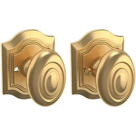 Baldwin Estate 5077 Bethpage Privacy Knob with R027 Rosette in Lifetime Satin Brass finish