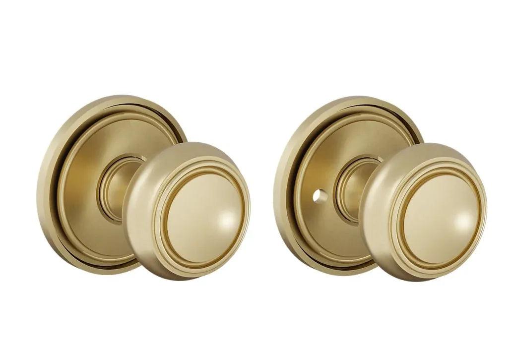 The Baldwin Estate 5087 Nashville Knob (2") with 5070 Rosette in Lifetime Satin Brass finish.