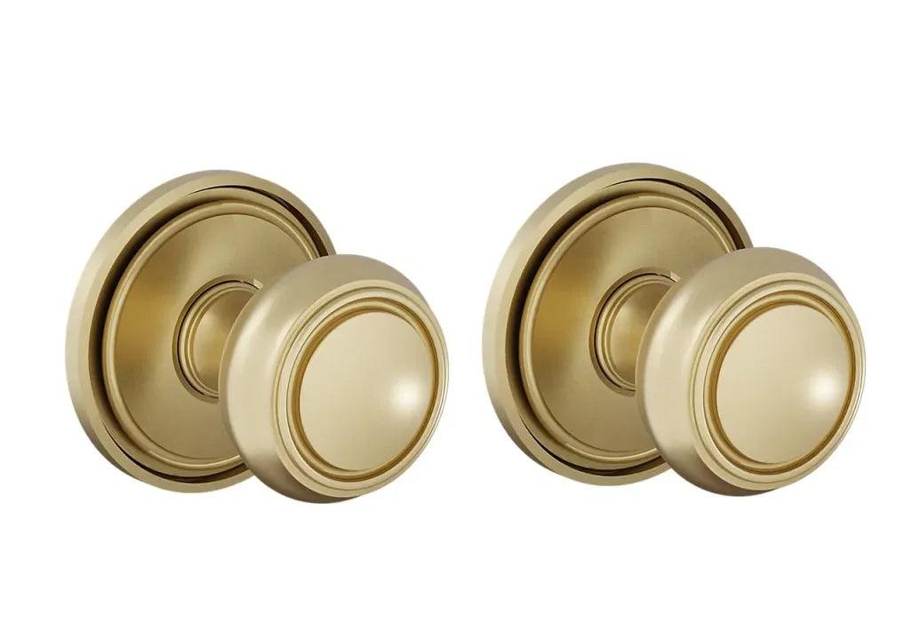 The Baldwin Estate 5087 Nashville Knob (2") with 5070 Rosette in Lifetime Satin Brass finish.